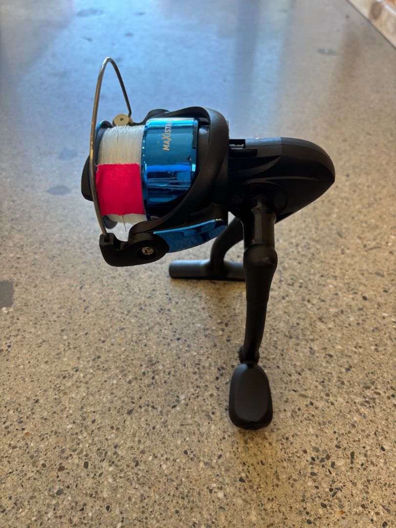 Black/Blue Maxstrike 6000 spinning reel